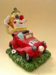 Clown in rood wagentje Puntenslijper