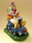 Clown in blauw wagentje Puntenslijper