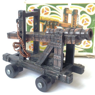 Cannon mounted on a wheeled chassis incorporating a pencil sharpener * LCAN 